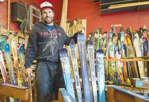 SITTING IN STYLE:  Paradise Ski Chairs, located at 322 Belleview Ave., constructs outdoor furniture from retired skis and snowboards.     photo by Lydia Stern